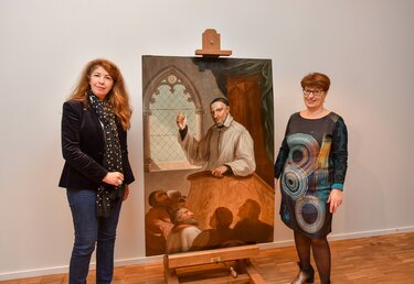 Le tableau Saint-Vincent de Paul restauré, présenté par Laurence Lamy, Conservateur du Musée d'Agesci, et Elisabeth Maillard, vice-présidente de l'Agglo en charge de la culture et du patrimoine historique